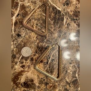 Triangular hoop earrings.